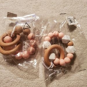 Two Silcone and Wood Teethers